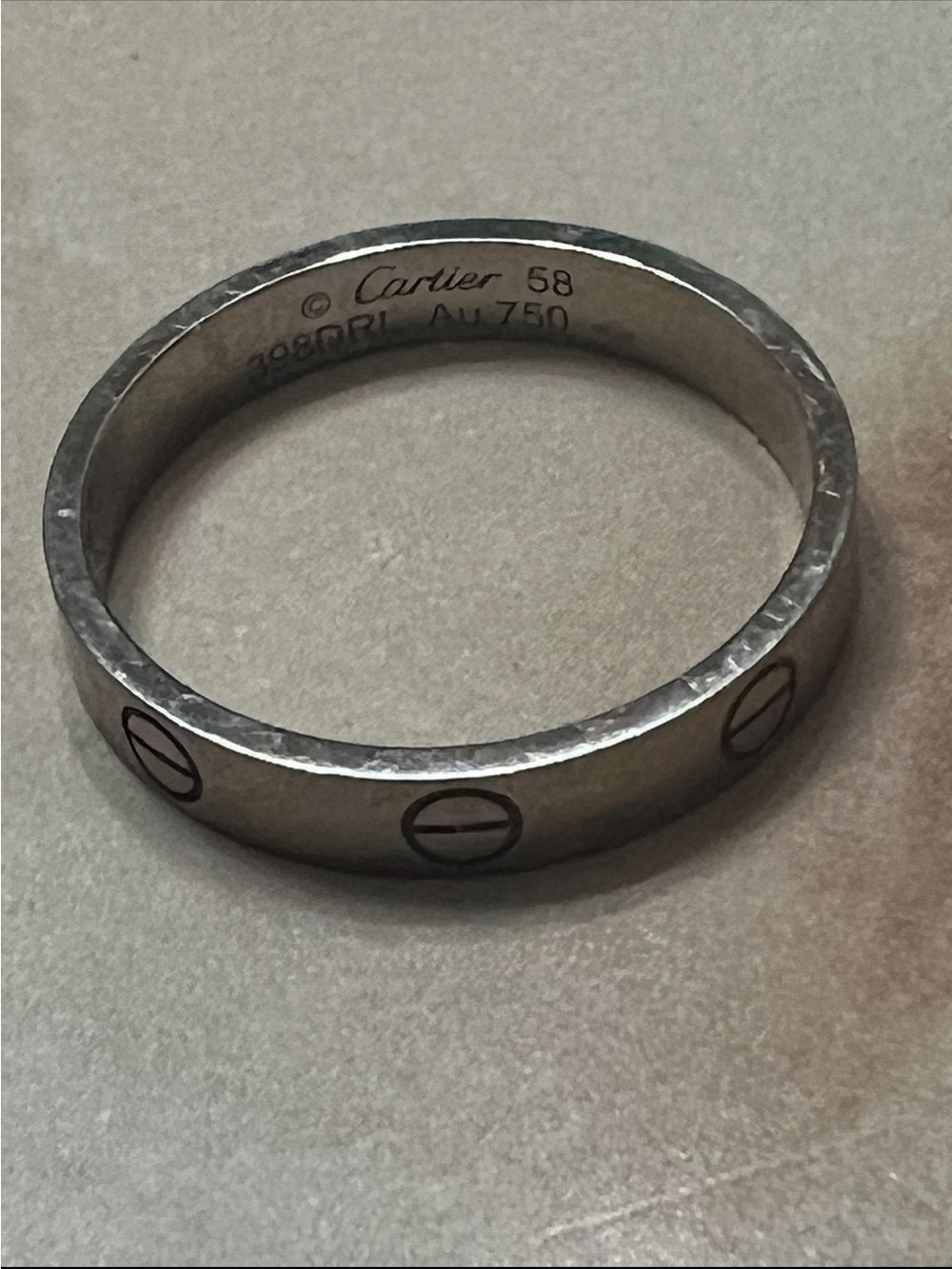 Cartier Silver Hammered Love Ring with Screw Motif
